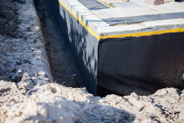 Professional Waterproofing technician working in Richwood, NJ